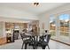 Eat-in kitchen with outside views provides abundant light to accent the dining area's unique decor at 8174 Field Cir, Arvada, CO 80005
