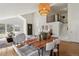 Inviting dining room with hardwood floors and modern light fixture at 8174 Field Cir, Arvada, CO 80005
