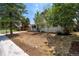 Charming home with mature landscaping in front yard at 3338 W Arlington Ave, Littleton, CO 80123