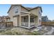 Backyard featuring a wooden deck and some lawn at 17530 E 95Th Ave, Commerce City, CO 80022