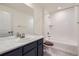 Bathroom with a tub/shower combo and updated vanity at 17530 E 95Th Ave, Commerce City, CO 80022