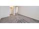 Bright, spacious bedroom with neutral carpet and walk-in closet at 17530 E 95Th Ave, Commerce City, CO 80022