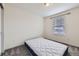 Cozy bedroom featuring a large window for natural light at 17530 E 95Th Ave, Commerce City, CO 80022