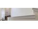 Stairway featuring a wooden staircase with white walls at 17530 E 95Th Ave, Commerce City, CO 80022
