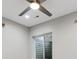 Basement bedroom includes updated light fixture, a window, and access to escape in case of emergency at 2317 S Galapago St, Denver, CO 80223