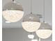 Close-up of a modern chandelier featuring crystal and chrome accents at 2317 S Galapago St, Denver, CO 80223