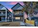 Modern two-story home featuring a balcony and contemporary design at 2317 S Galapago St, Denver, CO 80223