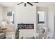 Modern fireplace with white tile surround and contemporary design at 2317 S Galapago St, Denver, CO 80223