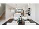 Open concept kitchen featuring stainless steel appliances and a large kitchen island at 2317 S Galapago St, Denver, CO 80223