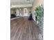 Spacious gym area featuring wood flooring and various exercise equipment, ideal for maintaining an active lifestyle at 2876 W 53Rd Ave # 106, Denver, CO 80221