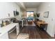 Bright living area with a cozy seating area, a modern kitchen, and a dining space at 2876 W 53Rd Ave # 106, Denver, CO 80221