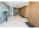 Grand lobby with tile floors, modern lighting, and a decorative water feature at 2876 W 53Rd Ave # 106, Denver, CO 80221