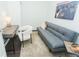 Cozy office space with neutral color palette, a comfortable sofa, and a well-lit work area at 2876 W 53Rd Ave # 106, Denver, CO 80221