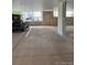 Indoor parking garage with clearly marked parking spaces, providing residents with a safe and convenient parking solution at 2876 W 53Rd Ave # 106, Denver, CO 80221