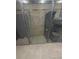 Storage unit with a metal grate door, offering residents a secure space for their belongings and extra storage needs at 2876 W 53Rd Ave # 106, Denver, CO 80221
