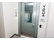 A yoga studio door with a window to view the studio inside, complete with modern fixtures and a sleek design at 2876 W 53Rd Ave # 106, Denver, CO 80221