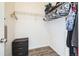 Walk-in closet with shelving and hanging storage for optimal organization at 18726 E Yale Cir # D, Aurora, CO 80013