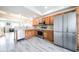 Well-equipped kitchen with stainless steel appliances and wood cabinetry at 18726 E Yale Cir # D, Aurora, CO 80013