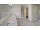 Bright bathroom with a double vanity and walk-in shower at 8545 Braun Loop, Arvada, CO 80005