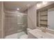 Modern bathroom boasts a glass-enclosed shower and sleek vanity at 8545 Braun Loop, Arvada, CO 80005