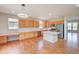 Spacious kitchen with stainless steel appliances, a center island, and ample counter space at 8545 Braun Loop, Arvada, CO 80005