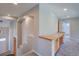Bright landing featuring a built-in desk area and lighted alcove at 8545 Braun Loop, Arvada, CO 80005