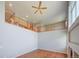 Loft area with wood railings overlooking the living room with vaulted ceilings at 8545 Braun Loop, Arvada, CO 80005