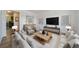 Bright and modern living room featuring stylish furnishings and contemporary decor at 16251 E 17Th Pl # C, Aurora, CO 80011