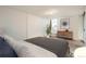 Serene bedroom with a large window and stylish furnishings, creating a relaxing space at 740 N Pearl St # 503, Denver, CO 80203