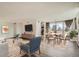 Open concept living and dining area with modern decor and large windows at 740 N Pearl St # 503, Denver, CO 80203