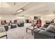 Large lounge area featuring a carpeted floor, comfortable seating, and a table for games or reading at 740 N Pearl St # 503, Denver, CO 80203