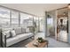 Cozy sun room with comfortable seating and natural light, adjacent to the kitchen at 740 N Pearl St # 503, Denver, CO 80203