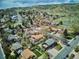 Panoramic aerial view of the property highlighting its neighborhood setting with views of surrounding mountains at 13588 W Exposition Dr, Lakewood, CO 80228