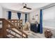 Playful room featuring a bunk bed, modern furnishings, and a cute teepee at 13588 W Exposition Dr, Lakewood, CO 80228