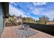 Relaxing deck with room for outdoor seating offering scenic neighborhood views at 13588 W Exposition Dr, Lakewood, CO 80228