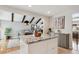 Bright kitchen boasts a large island with granite countertops and an adjacent breakfast nook at 13588 W Exposition Dr, Lakewood, CO 80228
