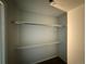 A walk-in closet with a shelf and hanger rod at 1273 S Jackson St, Denver, CO 80210
