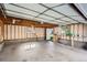 Large garage featuring an open ceiling and lots of potential at 1273 S Jackson St, Denver, CO 80210