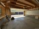 Unfinished garage with open garage door at 1273 S Jackson St, Denver, CO 80210