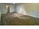 Spacious living room with neutral paint and carpeting at 1273 S Jackson St, Denver, CO 80210