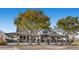 Charming community coffee house featuring a welcoming entrance, stone accents, and a cozy covered porch at 10808 Salida St, Commerce City, CO 80022