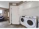 A laundry room featuring front loading washer and dryer at 10808 Salida St, Commerce City, CO 80022