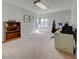 Bright bedroom featuring a window seat, office area, neutral tones and warm natural light at 18045 Sunburst Dr, Monument, CO 80132