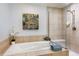 Bathroom features large soaking tub and glass enclosed shower at 2240 N Clay St # 501, Denver, CO 80211