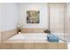 Bathroom features large soaking tub and glass enclosed shower at 2240 N Clay St # 501, Denver, CO 80211