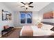 Bedroom featuring a comfortable bed, city views, and stylish decor at 2240 N Clay St # 501, Denver, CO 80211