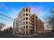 Multi-story RiverClay Residences building features unique architecture, balconies, and street-level retail space at 2240 N Clay St # 501, Denver, CO 80211