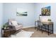 Office or flex space with soft chair and minimalist furniture at 2240 N Clay St # 501, Denver, CO 80211