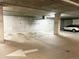 Designated handicap parking space in the parking garage of the building, including a white SUV at 2240 N Clay St # 501, Denver, CO 80211