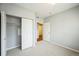 This bedroom features neutral walls and carpet, plus a closet for storage at 2809 Syracuse Ct # 129, Denver, CO 80238